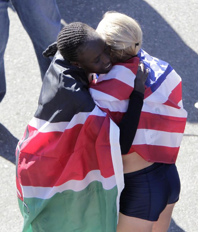 First place finisher Edna Kiplagat and second place finisher Shalane Flanagan